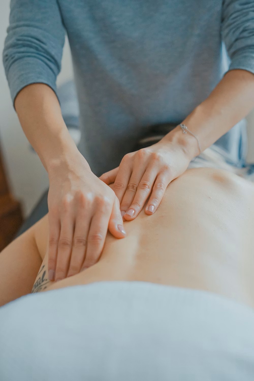 premium physical therapy and manual bodywork clinic interior table